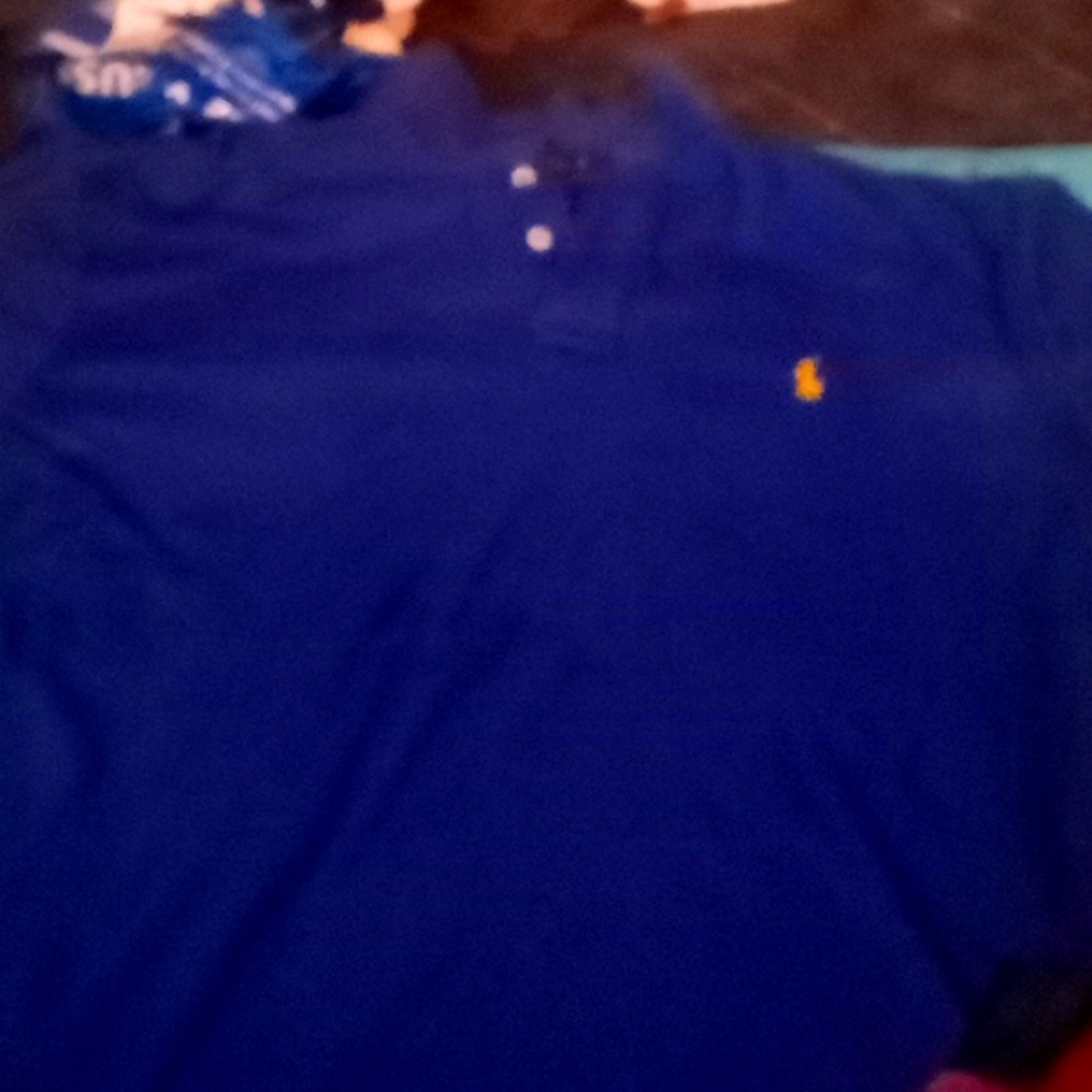 Lightly used blue with yellow horse logo Polo by Ralph Lauren Size Med.Retail$60